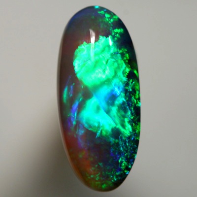 SOLID BLACK CRYSTAL OPAL Very bright turquoise and green over purple